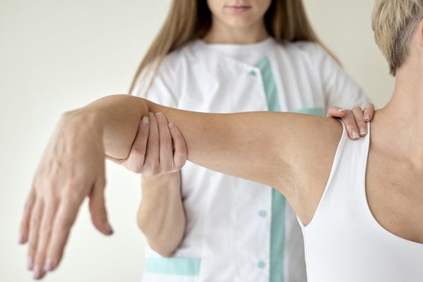 female-patient-undergoing-physical-therapy female-patient-undergoing-physical-therapy